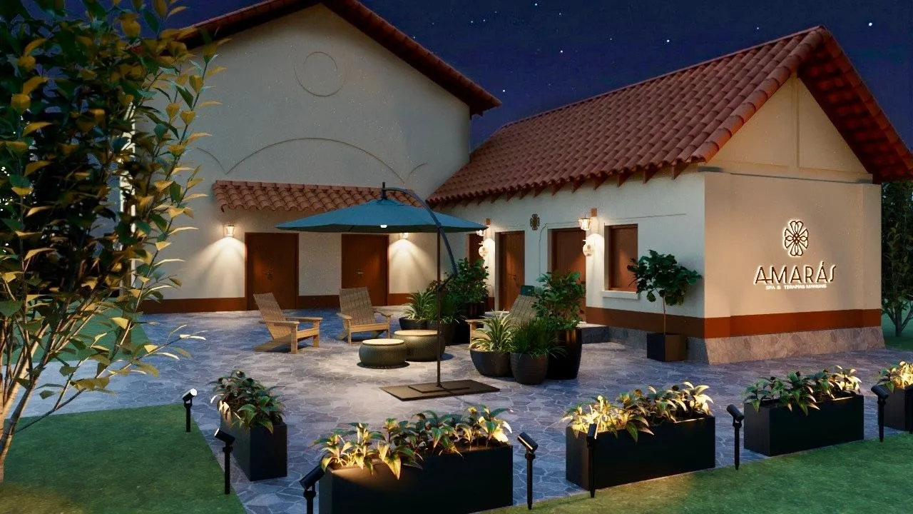Projeto da fachada da Amarás Spa Brotas à noite, com pátio e jardim
